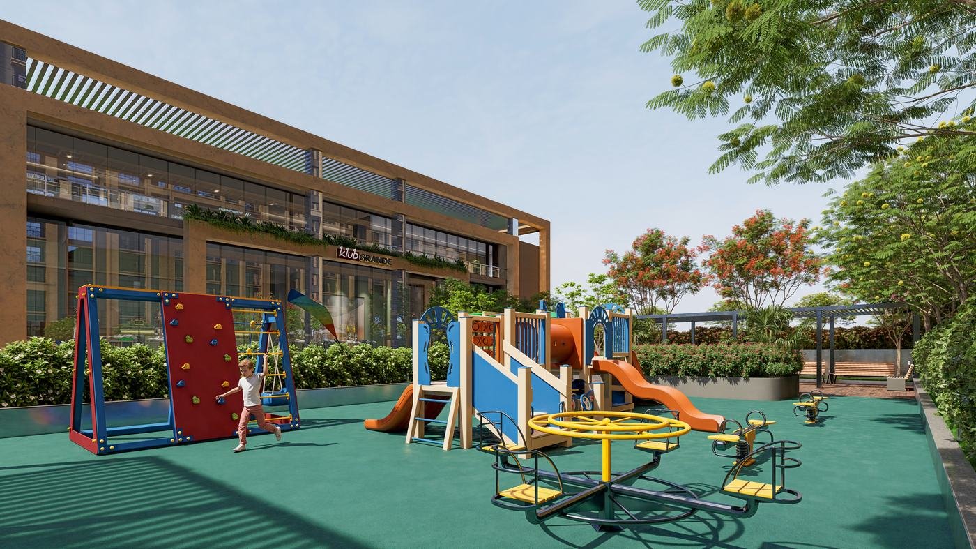 Children's play area at Kohinoor Royale Towers with climbing wall and play structures